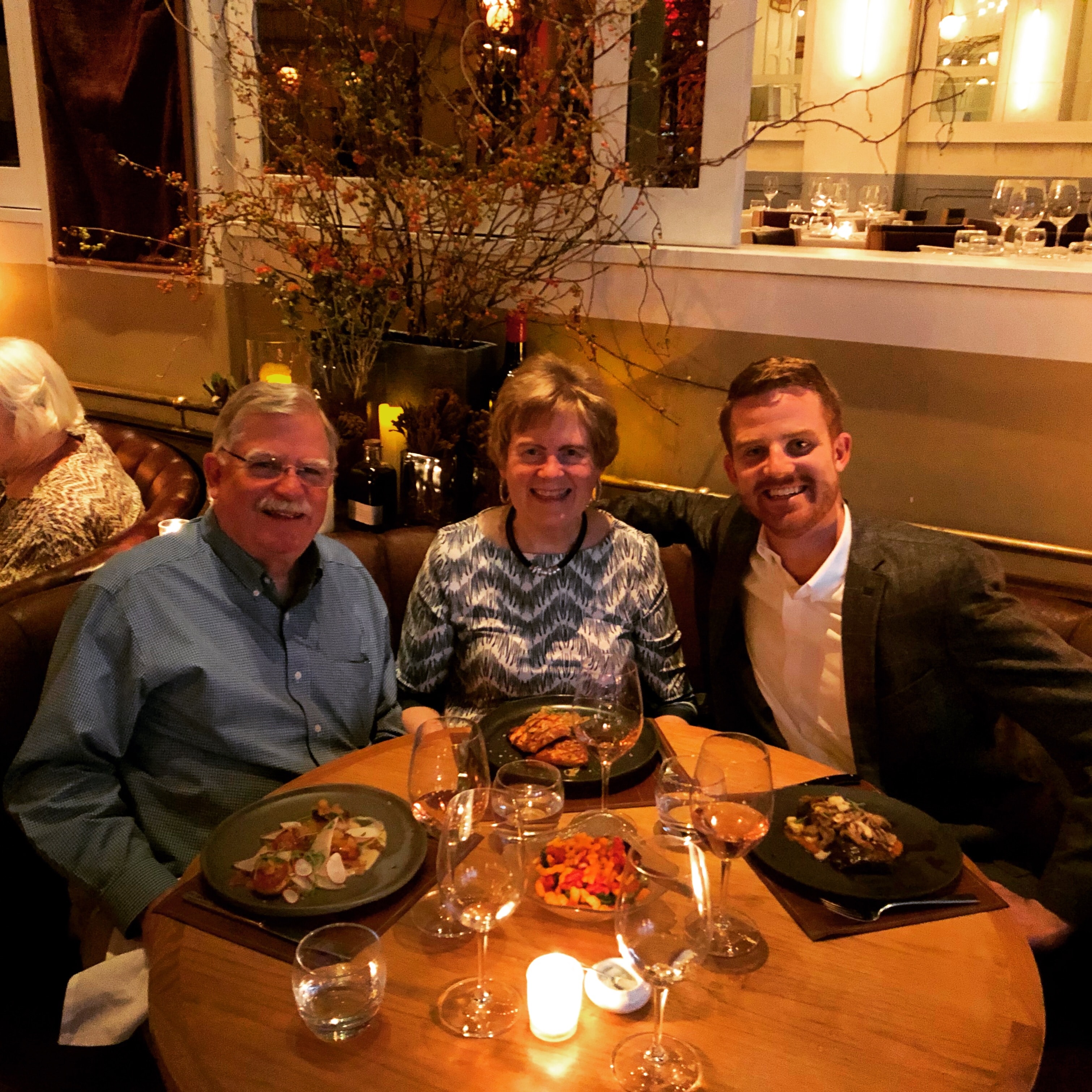 Three people dining together