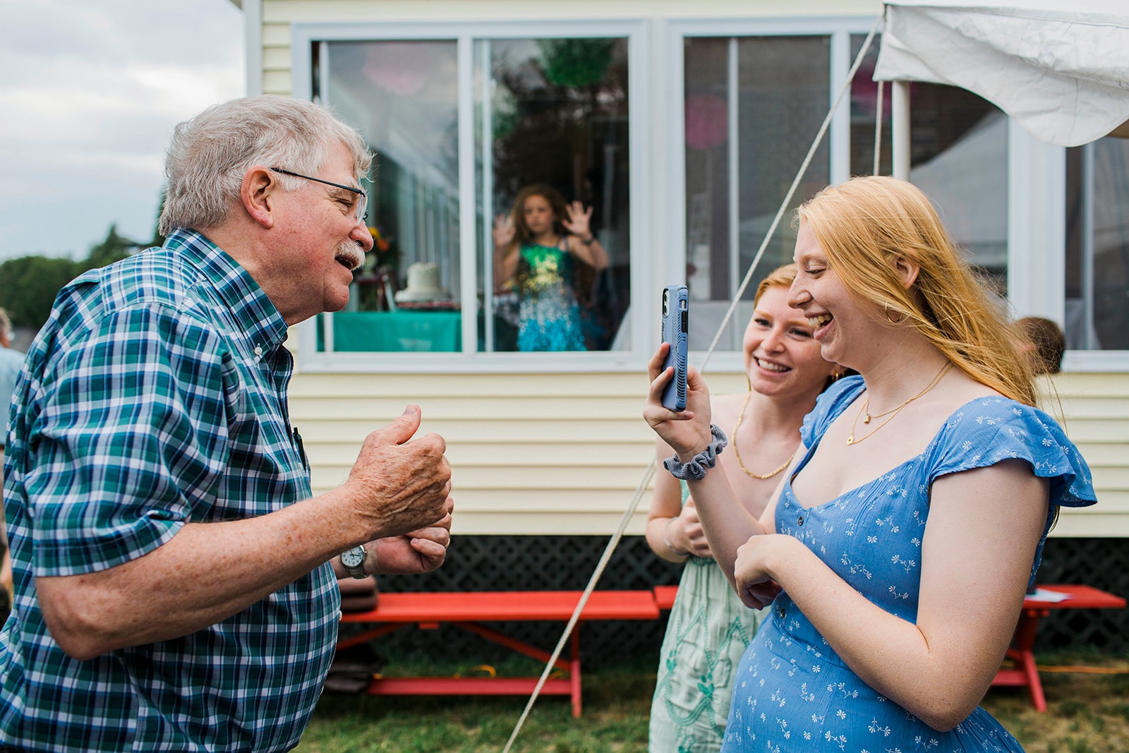 Grandfather taking a selfie with grandchildren